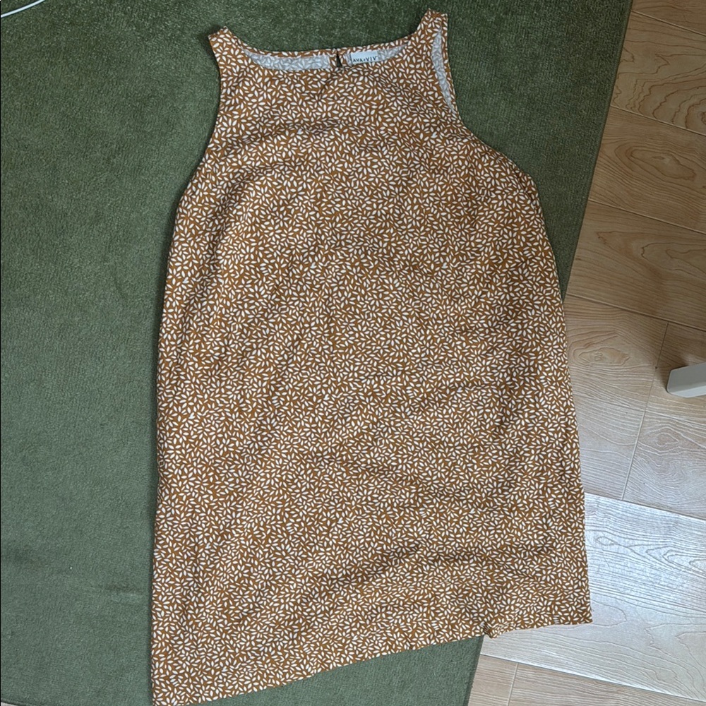 Burnt orange patterned sleeve less Dress